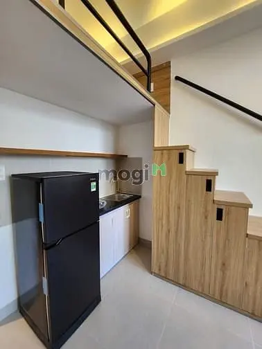 Duplex Ban Công Tone Màu Nâu Gỗ - Quận 7