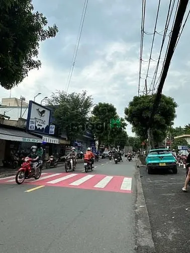 Nhỉnh 12 Tỷ Mtkd Sầm Uất Nguyễn Văn Quá 100M2 Ngang 4.1M 4 Lầu Gần Chợ