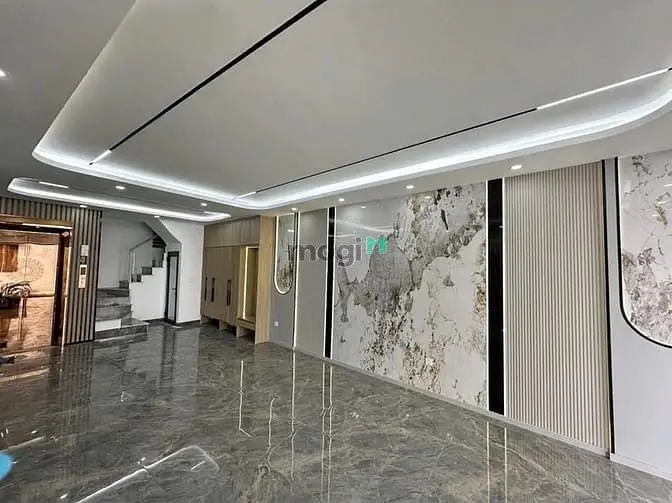 Đ.q.trung-57,2M * 7 Tầng Thang Máy- Nhà Mới Ở Ngay- Đối Diện Eon Lb